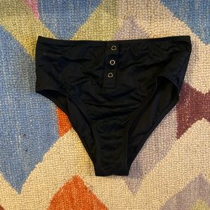 Black ribbed high waisted swim bottoms with gold snap closures!